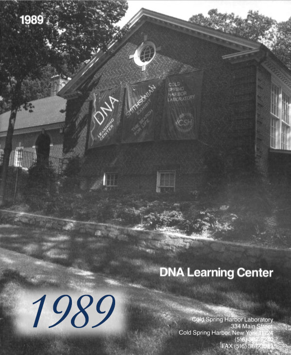 Annual report cover with black and white image of the DNA Learning Center brick building