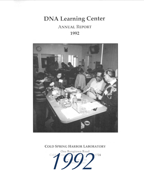 Annual report cover with black and white image of teachers in a laboratory classroom