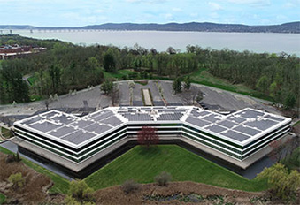 Regeneron DNA Learning Center building with Hudson River in the background